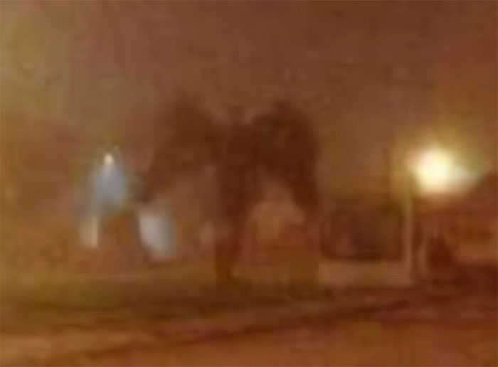 That image resembled a devil strolling down an empty street.