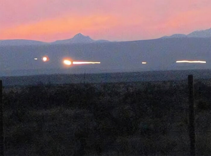 The Marfa light strip is visible at night.